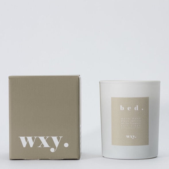 wxy. warm musk + black vanilla candle