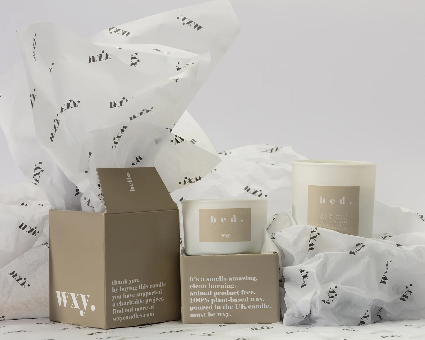 wxy. warm musk + black vanilla candle